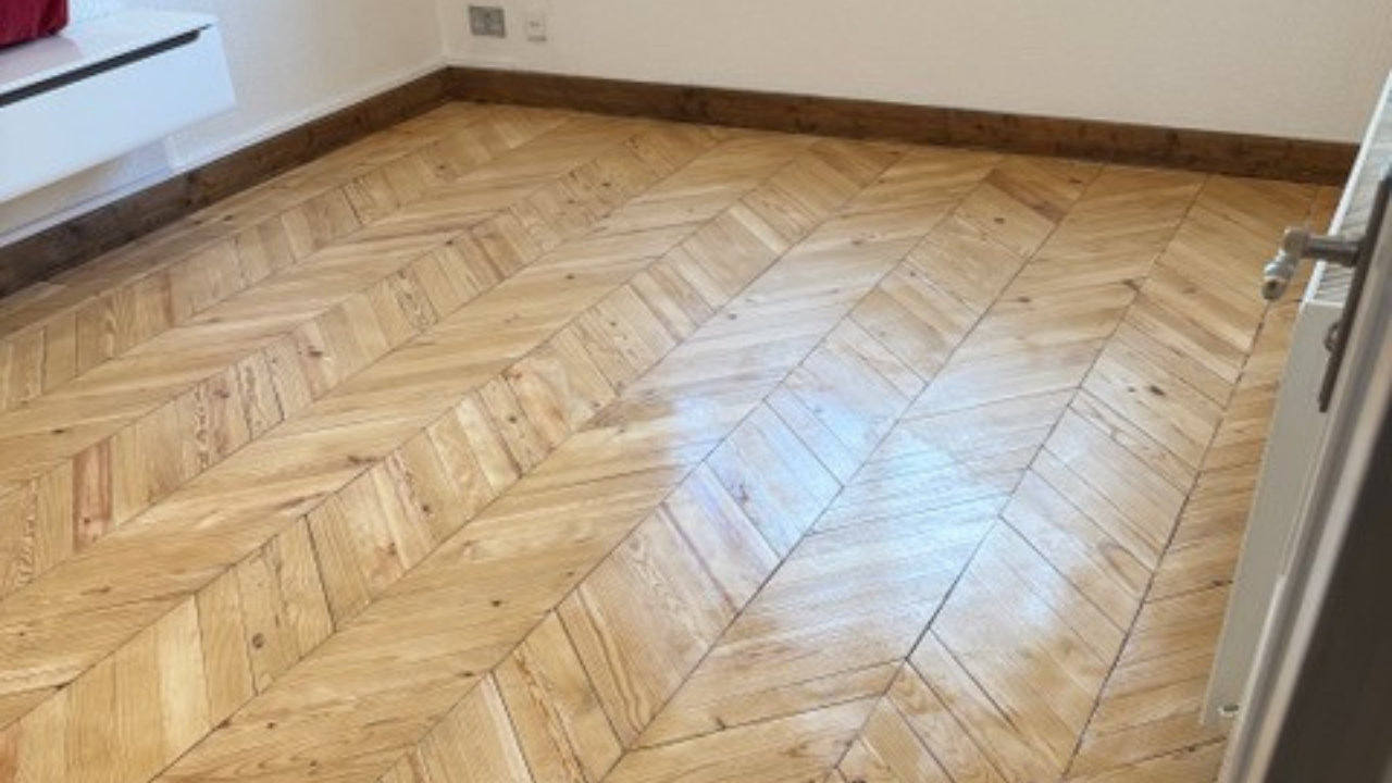 Parquet Floor Sanding in Farnborough on a light oak chevron parquet hardwood bedroom floor after refinishing